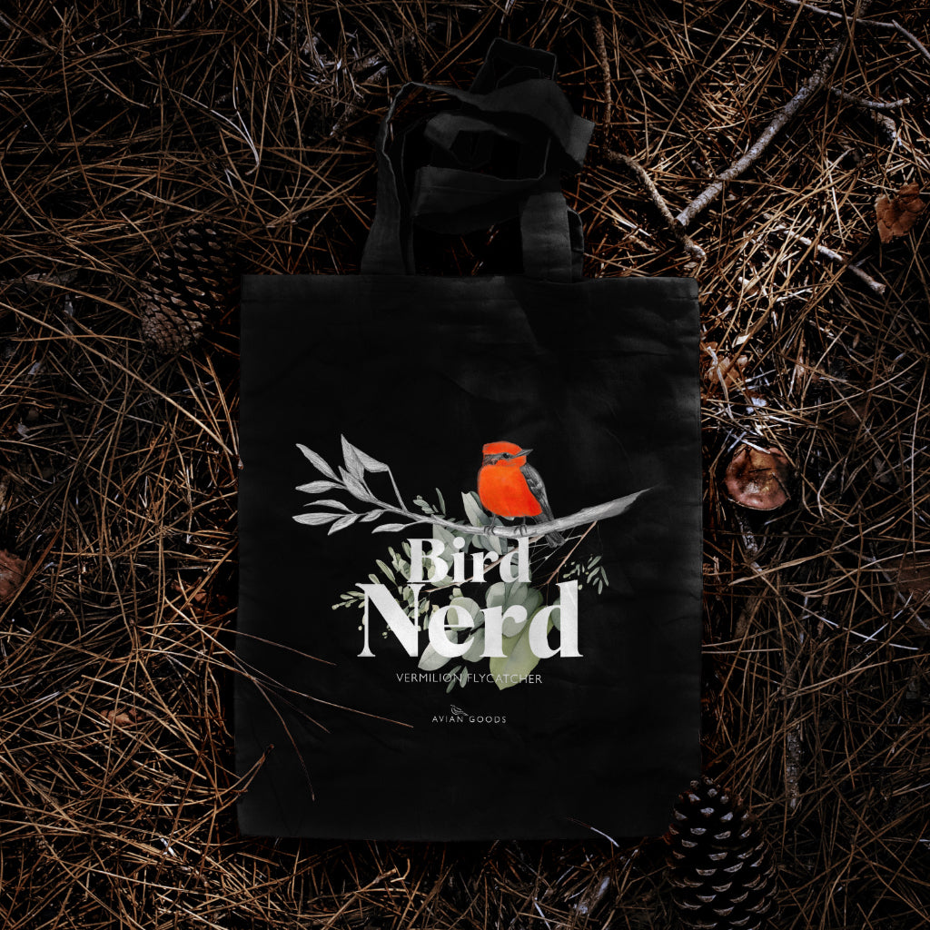 Black tote bag with vermilion flycatcher illustration and phrase bird nerd